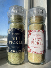 Load image into Gallery viewer, Close-up of coarse spicy pickle salt crystals with dill and garlic
